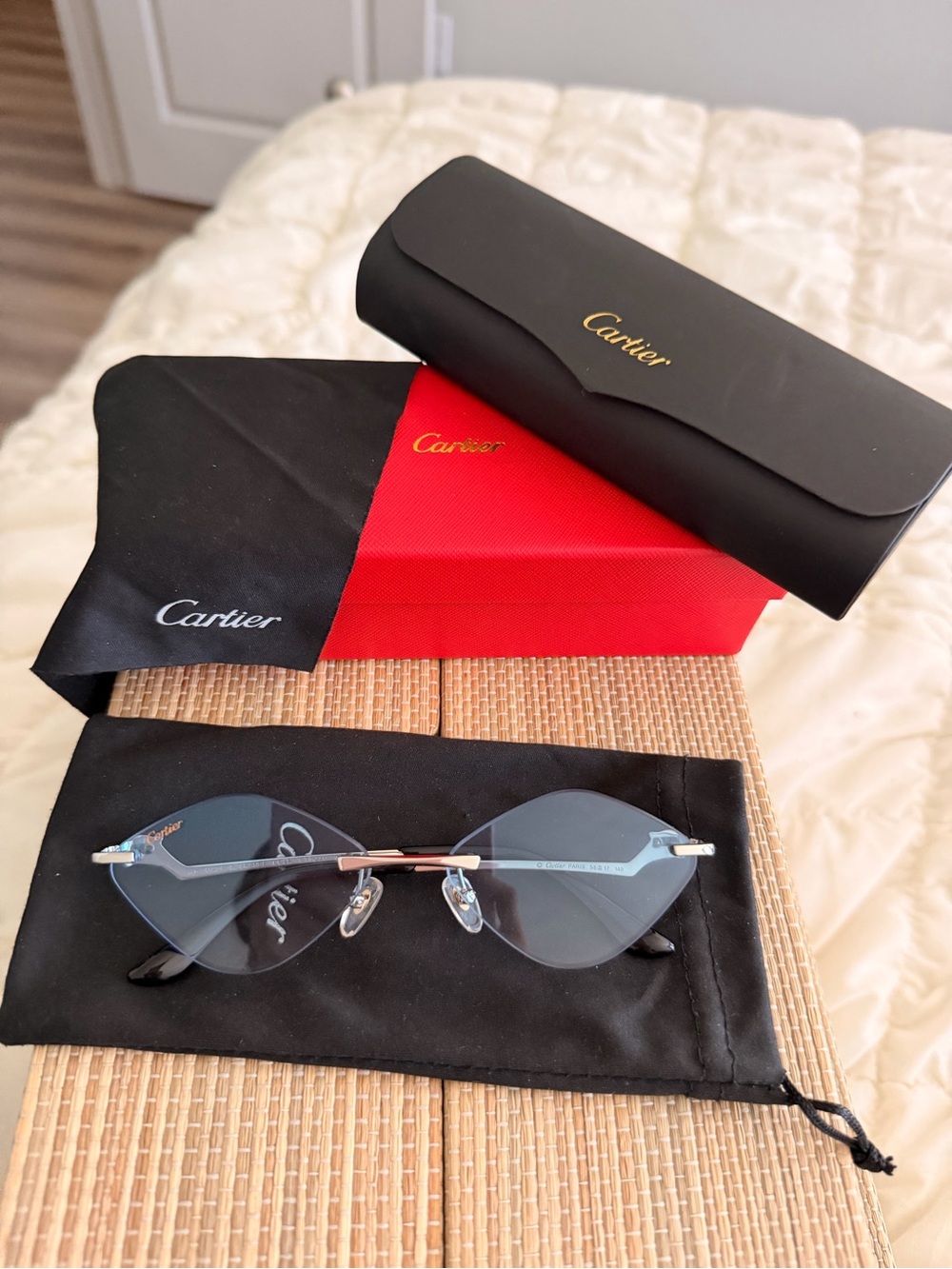 Cartier Rimless Sunglasses with Blue Lenses and Gold Accents